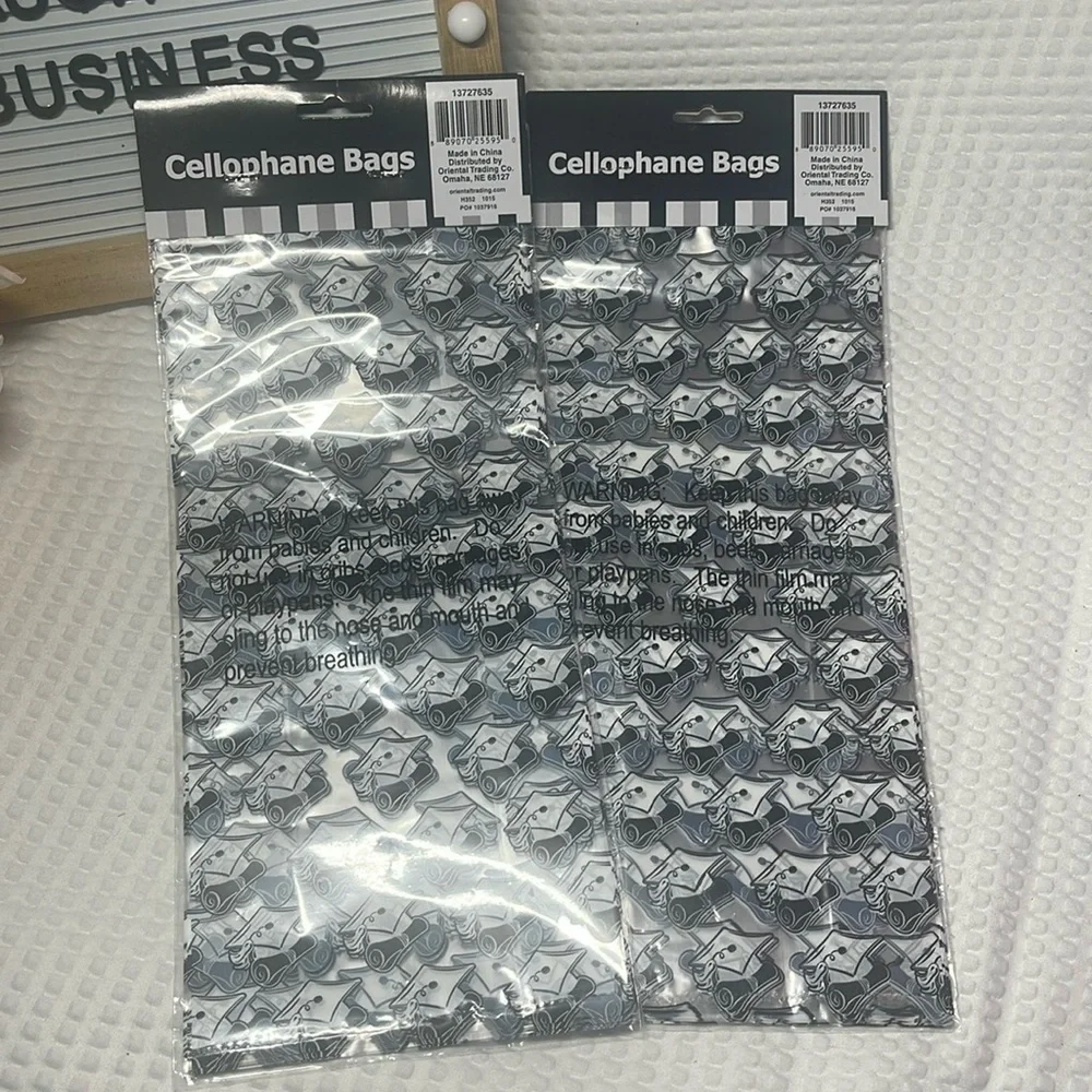 This is 2 packs with 12 in each one.. Set of 24 ~ Black Graduation Cello Bags